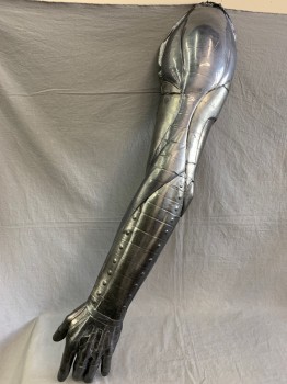 Unisex, Sci-Fi/Fantasy Space Oddity, MTO, Graphite Gray, L200FOAM, Solid, OS, Left Arm. Has Iridescent Silver Quality, Hard Shell is Cracked in Several Places See Detail Photos of Hand, Wrist, Armscye, Female Velcro at Shoulder for Attachment.