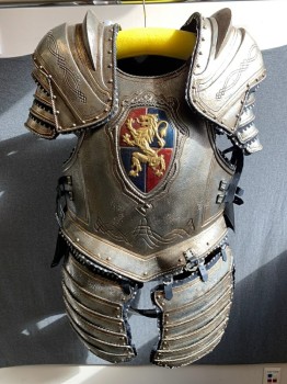 Mens, Historical Fict. Breastplate , MTO, Silver, Navy Blue, Rubber, Leather, 40, SUIT of ARMOR: Breastplate/Cuirass: Silver Rubber Aged to Look Like Metal, Molded Frame,  Leather Trim with Silver Triangle Metal Detail,  Gold Embossed Detail, Faux Rivets, Gold Lion Crest Front,Front and Back Plates, Leather Buckle Straps at Shoulder and Sides, Velcro Side Closures, Multiples See CF120857