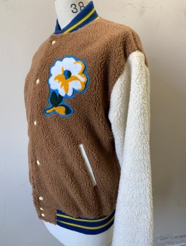 URBAN OUTFITTER, Lt Brown, Off White, Blue, Yellow, Green, Polyester, Solid, Floral, Fleece Whimsical Letterman Jacket, Brown Body and White Sleeves, Blue Striped Rib Knit Neck, Waistband and Cuffs, Large Flower Applique at Chest, Snap Closures