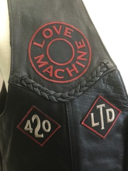 Mens, Leather Vest, UNIK LEATHER APPAREL, Black, Leather, Solid, Novelty Pattern, 52, 4 Black Snaps, 2 Pockets with Braided Leather, Lace Up Sides, Patches of "Love Machine, 420, LTD, Live Free", Modeled on a 44, Motorcycle