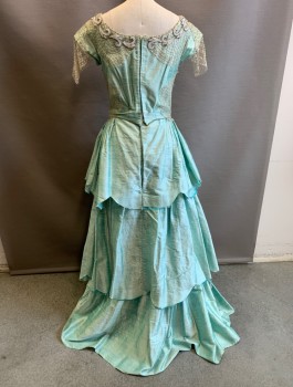 N/L MTO, Aqua Blue, Silver, White, Silk, Beaded, Solid, Ball Gown, Shantung Silk, Silver Net Lace on Bodice and Cap Sleeves, White Beaded Appliques Across Bust, Scoop Neck, V Shaped Waist, Full Skirt with Horizontal Ruffled Tiers, Floor Length, Raw Edge Hem, Historical Fantasy Made To Order