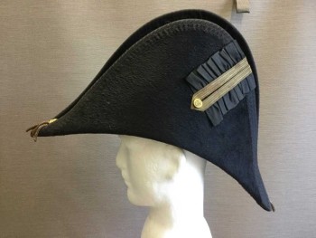 Mens, Historical Fiction Hat , MTO, Black, Gold, Wool, Metallic/Metal, Solid, 7 1/4, 22 1/2, 1800 Officer's Navel Bicorn. 1 Brass Button with Anchor. Aged Down Gold Ribbon Detail on Side with Gathered Black Grosgrain. Black Brocaded Ribbon Trim at Edges. Gold Braid Cord Hat Band with Bullion Tassles