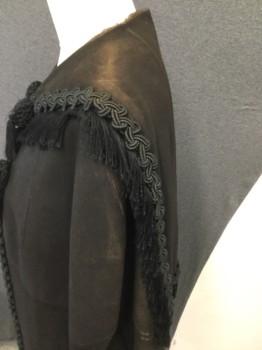 Womens, Cape 1890s-1910s, EVA'S, Black, Leather, Rayon, Solid, N/S, Black Suede Cape with Black Trim with Fringe at Sailor Collar. 4 Tassles at Front, Hook & Eye Closure, Trim at Center Front, Sun Damage at Shoulder. Repair on Both Shoulders Under Collar. See Photos for Close Up. Some Wear and Dis coloring at Neckline and Hemline