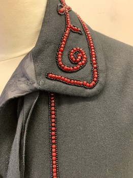 Womens, Cape 1890s-1910s, MTO, Black, Red, Wool, Acetate, Solid, O/S, Plain Weave Wool, Hand Holes, Collar with Red & Black Beading, Beads Down Center Front & Hem, Petersham Ribbon Ties at Neck, Hook & Eyes Center Front, Missing a Few Beads Center Back See Detail Photo,