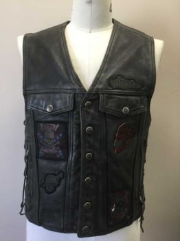 Mens, Leather Vest, HARLEY DAVIDSON, Black, Multi-color, Leather, Solid, Logo , L, Leather with Assorted Biker Patches (Skulls, Flames, "Rebel to the Death" Logo, Etc), Snap Front, 4 Pockets, Silver Grommets with Leather Laces Up Sides, Silver Metal Star Studs at Sides, Several Pyramid Metal Studs in Back, But Most are Now Missing **Leather is Aged/Worn Throughout