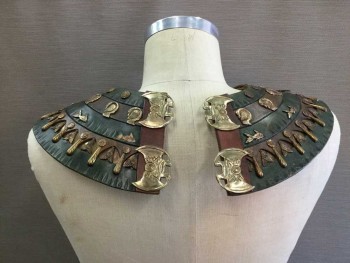 Unisex, Historical Fiction Collar, M.T.O., Forest Green, Brown, Brass Metallic, Leather, Metallic/Metal, Egyptian Leather Collar In Brown and Green with Brass Studs Of Medallions, Fish, Birds and Abstract Shapes. Leather Has Embossed Detail. 4 Brass Detail At Center Back Neck For Closure. One Fish Missing At Center Back Left