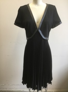 THE KOOPLES, Black, Viscose, Leather, Solid, Short Sleeves, Top Half is Solid, V-neck, with 3/4" Wide Leather Trim at Neck, Cuffs and Angled Waistline, Skirt is Chemically Pressed Knife Pleats, Hem Above Knee