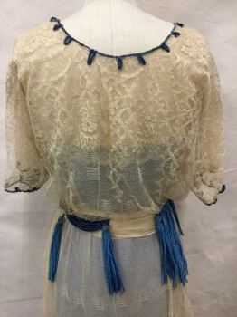 Womens, Dress 1890s-1910s, LADY DUFF GORDON INC, Beige, Cornflower Blue, Cotton, Silk, Floral, W24, B32, Light Beige Chantilly Lace, Short Sleeve Edged with Cornflower Blue Silk Chenille Yarn, Ribbon, Open Center Front with Snaps and Hooks and Eyes, Waist Detail with Blue Chenille Drapes Finishing In Tassels, Round Neckline Edged with Chenille Yarn In Loops, Skirt Double Layer Of Chantilly Lace, Lined with Light Beige Silk Chiffon, Has Blue Slip with It, A Couple Mended Spots In The Lace,