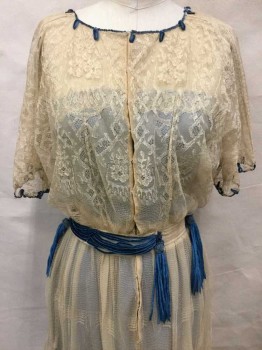 LADY DUFF GORDON INC, Beige, Cornflower Blue, Cotton, Silk, Floral, Light Beige Chantilly Lace, Short Sleeve Edged with Cornflower Blue Silk Chenille Yarn, Ribbon, Open Center Front with Snaps and Hooks and Eyes, Waist Detail with Blue Chenille Drapes Finishing In Tassels, Round Neckline Edged with Chenille Yarn In Loops, Skirt Double Layer Of Chantilly Lace, Lined with Light Beige Silk Chiffon, Has Blue Slip with It, A Couple Mended Spots In The Lace,