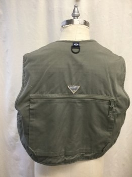 COLUMBIA, Dk Olive Grn, Cotton, Polyester, Solid, Zip Front, V-neck, Lots of Pockets, 1 Large Back Zip Pocket,  1 Yellow Lure Attached to Pocket, 1 Shearling Patch, Hunting and Fishing