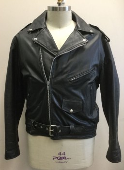 UNIK LEATHER APPAREL, Black, Leather, Solid, Motorcycle Jacket with Off Center Zipper at Front, Self Belt with Silver Buckle Attached at Waist, 4 Pockets, Epaulettes at Shoulders