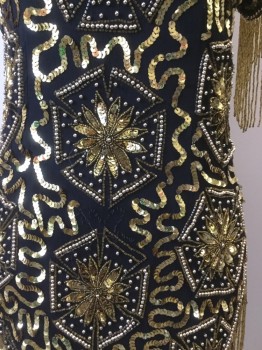 MARK & JOHN, Black, Gold, Silk, Sequins, Floral, V Neck Black Chiffon with Gold Beaded & Gold Sequin Floral Pattern. Short Sleeves, Tiny Gold Beaded Tassles at Sleeves and Hemline, Cross Over Wrap Drape at Hemline. Some Damage at Shoulders and Front Has Some Sequins Missing.
