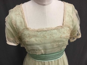 Womens, Evening Dress 1890s-1910s, Cream, Mint Green, Silk, Cotton, Solid, Floral, 28, 32, Bodice Is A Mint Chiffon with Cream Embroidered Mesh Overlay and Satin Trim. Attached Mint Satin Cummerbund, Cream Embroidered Mesh Apron Over Mint Chiffon Floor Length Skirt. Double Cream Silk Underskirt with Ruffle Hem. Back Waist Has Mint Double Sash Detail and Cream Rectangular Train with Lace Overlay and Silk Floret Applique All Bordered In French Knot Embroidery,