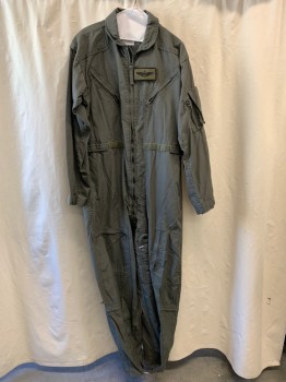 Mens, Coveralls/Jumpsuit, PROPPER, Sage Green, Nomex, 38R, Military Flight Suit, Air Force Senior Pilot Velcro Breast Patch, Collar Attached, Zip Front, Slanted Zipper Pockets on Chest, Velcro Self Belt, Pockets on Sleeves, Zippers on Legs, Cargo Pockets, Velcro Cuffs, (AGED)