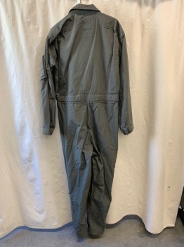 Mens, Coveralls/Jumpsuit, PROPPER, Sage Green, Nomex, 38R, Military Flight Suit, Air Force Senior Pilot Velcro Breast Patch, Collar Attached, Zip Front, Slanted Zipper Pockets on Chest, Velcro Self Belt, Pockets on Sleeves, Zippers on Legs, Cargo Pockets, Velcro Cuffs, (AGED)