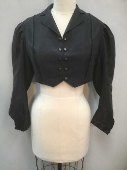 Womens, Jacket 1890s-1910s, N/L, Black, Solid, B:38, Long Sleeves, Hook and Eye Closures At Center Front, with 2 Columns Of Self Fabric Buttons On Either Side **Fabric On Buttons Is Very Worn Off, Revealing Metal Underlayer, 2 Vertical Twill and Braided Stripes Of Trim On Either Side Of Bust, Notched Collar, Leg O Mutton Sleeves with Pleated Shoulders, Folded Cuffs with 2 Buttons, Black Lining,  **Has Wear Throughout: A Number Of Mends and Holes At Bust, Cuffs, and Scatterred Throughout, Some Light/Sun Damage At Shoulders, Worn Fabric On Buttons,