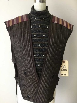 Mens, Vest, N/L, Dk Brown, Red Burgundy, Gold, Lt Pink, Leather, Polyester, Stripes - Diagonal , Stripes - Horizontal , 38, Silver Studded Leather Moc Turtleneck, with Horizontal Stitching, Ribbed Poly Vest with Burg, Gold, Lt Pink Patterned Stripe Yoke, Braided Brown Leather Side Straps, Pull Over, See Photo Attached,