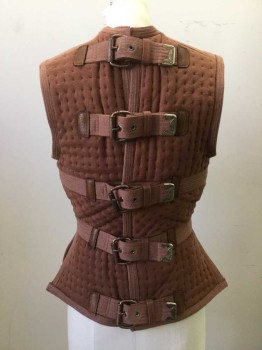 Unisex, Sci-Fi/Fantasy Vest, MTO, Brown, Cotton, Leather, Solid, W 27, CH 36, Quilted Jersey with Cotton Webbing Trim and 5 Large Copper Buckle Straps at Center Back. Sleeveless. Slit Neck Front Crew Neck with Leather Tab. Peplum Waist. Open at Side Waist