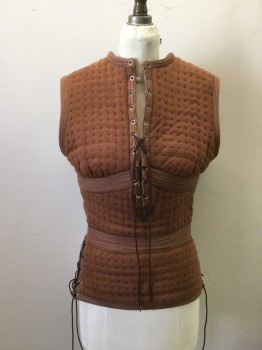 Womens, Sci-Fi/Fantasy Vest, MTO, Brown, Cotton, Leather, Solid, 27, 36, Quilted Jersey with Cotton Webbing Trim and 5 Large Copper Buckle Straps at Center Back. Sleeveless. Slit Neck Front Crew Neck with Lacing And  Leather Tab. Peplum Waist. Lacing at Side Waist