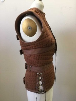 Womens, Sci-Fi/Fantasy Vest, MTO, Brown, Cotton, Leather, Solid, 27, 36, Quilted Jersey with Cotton Webbing Trim and 5 Large Copper Buckle Straps at Center Back. Sleeveless. Slit Neck Front Crew Neck with Lacing And  Leather Tab. Peplum Waist. Lacing at Side Waist