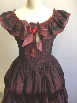 N/L, Red Burgundy, Black, Red, Polyester, Solid, Burgundy Taffeta, Cap Sleeve, Scoop Neck, Black Floral Embroidery at Ruffled Collar/Neckline, with Burgundy Lace and Burgundy Velvet Trim at Edges, Boned/Structured Bodice with Busk Closure at Center Back, Burgundy Ribbon Bow at Center Front Bust with Red and Burgundy Flowers, Tiny Silver Buttons at Waist, Attached Skirt is Full, Multi Tiered with Burgundy Fringe Trim and Black Gimp Trim on Alternating Tiers, Mid 1800's Made To Order Reproduction
