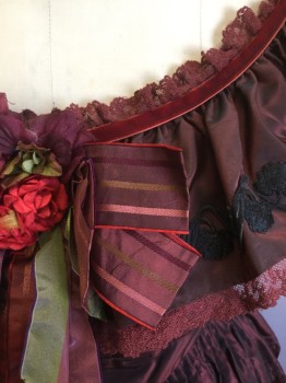 N/L, Red Burgundy, Black, Red, Polyester, Solid, Burgundy Taffeta, Cap Sleeve, Scoop Neck, Black Floral Embroidery at Ruffled Collar/Neckline, with Burgundy Lace and Burgundy Velvet Trim at Edges, Boned/Structured Bodice with Busk Closure at Center Back, Burgundy Ribbon Bow at Center Front Bust with Red and Burgundy Flowers, Tiny Silver Buttons at Waist, Attached Skirt is Full, Multi Tiered with Burgundy Fringe Trim and Black Gimp Trim on Alternating Tiers, Mid 1800's Made To Order Reproduction