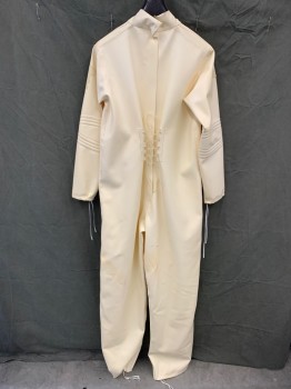 Unisex, Sci-Fi/Fantasy Jumpsuit, MTO, Cream, Rubber, Solid, Ch 38, Stand Collar, Zip Back Center Front Circle Patch, Long Sleeves, Foam Filled Quilted Elbows and Knees, Clear Plastic String Tie Back Through Self Loops, Drawstring Sleeve and Leg Hems, Multiples