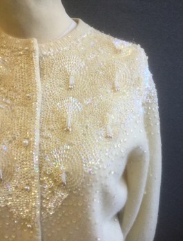 DRAGON HOUSE, Cream, Wool, Sequins, Knit Cardigan with Cream Sequins and Beaded Tassles at Upper Chest/Shoulders, Long Sleeves, Round Neck,  Pearl Buttons at Center Front