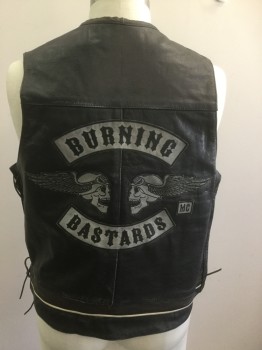 UNIK LEATHER APPAREL, Black, Leather, Solid, Novelty Pattern, 4 Silver Snaps, Brown Leather Edge, White Leather Piping, Lace Up Sides, 2 Zipper Pockets, Back Has Patches "Burning Bastards MC", Skulls with Wings, Modeled on a 44, Motorcycle