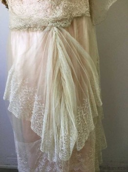 Mto, Peach Orange, Cream, Silk, Polyester, Solid, Floral, Peach Satin with Cream Tulle Overlay with Lace Trim, Sequinned Detail at Neckline, Pink Beaded Tassles at Shoulder Front. Antique Rose Bud at Center Front Waist and Side Seam. 3 Tiered Lace Overlay. Some Evidence of Repair on Front Skirt,