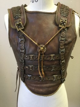 MTO, Brown, Leather, Greek/Roman Soldier Breast Plate. Leather Bands with Gold Painted Metal Details, Braided Leather Shoulder Panels, Adjustable Shoulder Panel to Center Front Medallion, Adjustable Size At Sides with Leather Lacing