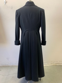 NL, Black, Wool, Acetate, Solid, Long Black Coat ,2 Button Double Breasted Closure Wide Lapel with One Scallop Pointed Peak , Small Cording Trim1/2 Inch From Lapel and Cuff Edges.,turned Up Cuff with Double Peak Detail, Three pleats in Back Creating a Double Panel Effect From Waist to the Floor
