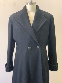NL, Black, Wool, Acetate, Solid, Long Black Coat ,2 Button Double Breasted Closure Wide Lapel with One Scallop Pointed Peak , Small Cording Trim1/2 Inch From Lapel and Cuff Edges.,turned Up Cuff with Double Peak Detail, Three pleats in Back Creating a Double Panel Effect From Waist to the Floor