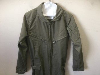 FLIGHT SUIT, Olive Green, Polyester, Cotton, Solid, Zip Front, Rounded Collar, Lots of Zipper Pockets, Zip Ankles, Velcro Tabs at Cuffs of Long Sleeves, Adjustable Velcro Tab Waistband, Maybe This is What They Wear in the Air Force or Maybe You Just Want to Look Cute and Kind of Tough at the Same Time