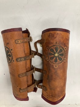 MTO, Lt Brown, Faded Black, Leather, Metallic/Metal, Solid, Floral, Textured, Aged, 4 Brass Buckle Closures. 16" Wide At Top Of Calf. 2 Embossed Medallions, Dark Red Leather Trim At Top And Bottom. PAIR. MULTIPLE