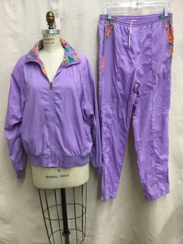 HEAD SPORTSWEAR, Lavender Purple, Assorted Colors, Yellow, Teal Green, Pink, Nylon, Solid, Floral, 2 Piece Track Suit: Jacket/Top Is Long Sleeve, Zip Front, **Reversible** One Side Is Solid Lavender, Other Side Is Floral Multicolor Patterned, Lavender Ribbed Knit Cuffs & Waistband, 2 Pockets, Barcode in Pocket on Purple Side