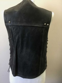 HARLEY DAVIDSON, Black, Multi-color, Leather, Solid, Logo , Leather with Assorted Biker Patches (Skulls, Flames, "Rebel to the Death" Logo, Etc), Snap Front, 4 Pockets, Silver Grommets with Leather Laces Up Sides, Silver Metal Star Studs at Sides, Several Pyramid Metal Studs in Back, But Most are Now Missing **Leather is Aged/Worn Throughout