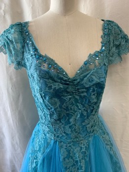FOX332, Teal Blue, Nylon, Spandex, A-Line, Lace Bodice, Sweetheart Neckline, Rhinestones & Beads Along Neckline, Cap Sleeve, Attached Solid Slip, Side Zipper & Snap Buttons, Tulle Skirt, 6 Upside Down Lace Triangles on Skirt
