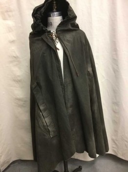 N/L, Olive Green, Brown, Beige, Black, Cotton, Solid, Abstract , Heavy Cotton Canvas, Open Front with Button Closures, Brown Cord Tie At Neck, Splatterred Dark Black Paint & Tan Spray Painted Detail In Back, Arm Holes At Sides, Hooded, Aged/Worn