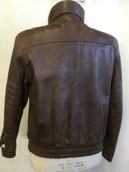  LEATHER WAREHOUSE, Brown, Leather, Solid, Collar Attached with Self Short Belt/2 D-ring Buckles, Hidden Zip Front, with Worn Out Brass Snap Button Front, 2 Pockets with Slant Zipper & Flap Brass Snap Button, Long Sleeves with Self Quilt Elbow Patch, Cuffs with Matching Snap Button, Shinny Light  Brown Lining, Elastic Back Hem