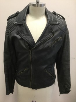 N/L, Black, Leather, Solid, Motorcycle Jacket with Off Center Zip Front, 3 Zip Pockets, Braided Leather Epaulettes at Shoulders, Self Laces at Side Waist, Bullseye Stitching at Shoulders, Black Quilted Lining