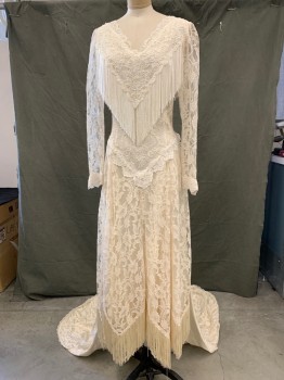 MARTIN MCCREA, Eggshell White, Polyester, Solid, Floral, Floral Lace Over Satin, V-neck, Passementerie Over Mesh V-neck with Beading V Shape at Neck with Fringe, Sheer Lace Long Sleeves, Floral Lace White Trim, Zip Back, Jagged Hem with Fringe, with Attached Train,