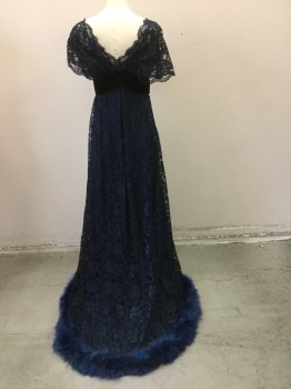 N/L (MTO), Navy Blue, Black, Silk, Synthetic, Floral, Empire Line . Blue Silk with Black Lace Overlay. Cream and Black Lace Detail at Neckline. Black Sequin Detail at Bust Line Front, High Waist Trimmed with Black Velvet Ribbon. Blue Marabou Trim at Hemline. Hook & Eye Closure at Center Back,