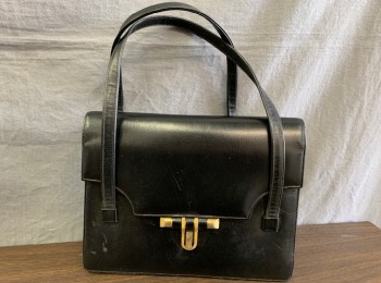 SUSAN GAIL, Black, Leather, Solid, Fold Over Closure with Gold Rectangular Embossed Clasp, 2 Self Handles, Lining is Black Leather,