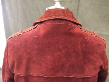FOX 83, Red Burgundy, Suede, Solid, Mens 1970's Suede Jacket, 3 Leather Button Closure Center Front, 4 Patch Pockets with Silver Rectangle Buckle Strap Closures, Cream Top stitching with Leather and Metal Tabs at Shoulders. Repaired Harness Slits at Both Back Shoulders and Repaired Slit at Left Front Shoulder