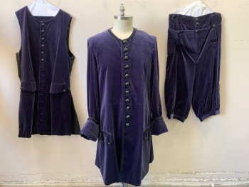 MTO, Aubergine Purple, Black, Cotton, Synthetic, Solid, Velveteen, Black Trim and 11 Fleur-de-lis Buttons, Cuffs and Faux Pockets with Flaps and Buttons. 2 Spots of Discoloration on Right Shoulder See Detail Photo, Late 1600s