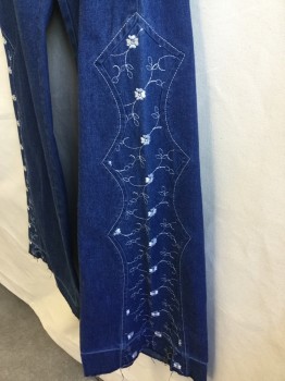 PRIOR, Blue, White, Cotton, Solid, Floral, White Top Stitches, 2 Fake Wedge Pockets Front, Zip Front, in Lay Self Denim with White Floral Embroidery on Work on Bottom 1/2 Legs, Flair Bottom, and Raw Hem