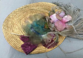 N/L, Tan Brown, Straw, Silk, Solid, Tan Straw That's Dirty/Dingy/Stained Overall, Curved/Stylized Disc Shape, Gray/Purple/Pink Silk Flower Petals, Gray Ostrich Feather, Horsehair Loops Sewn On Inside