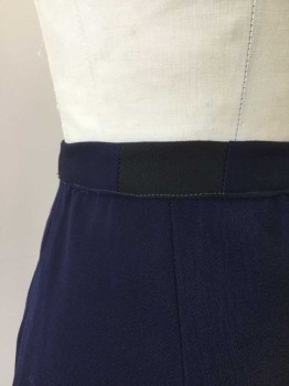NL, Navy Blue, Wool, Solid, Lightly Tapered.  Center and Back Seam. Side Seam Zipper. Slits at Side Seams. Black Fabric Inserted to Right Waist