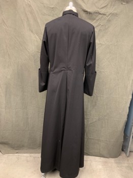 CHURCH STORES, Black, Wool, Solid, Fabric Covered Button Front, Stand Collar, Long Sleeves, Oversized Folded Back Cuff, Floor Length Hem, Pleated Center Back, Side Seam Pleats with Pocket Slits